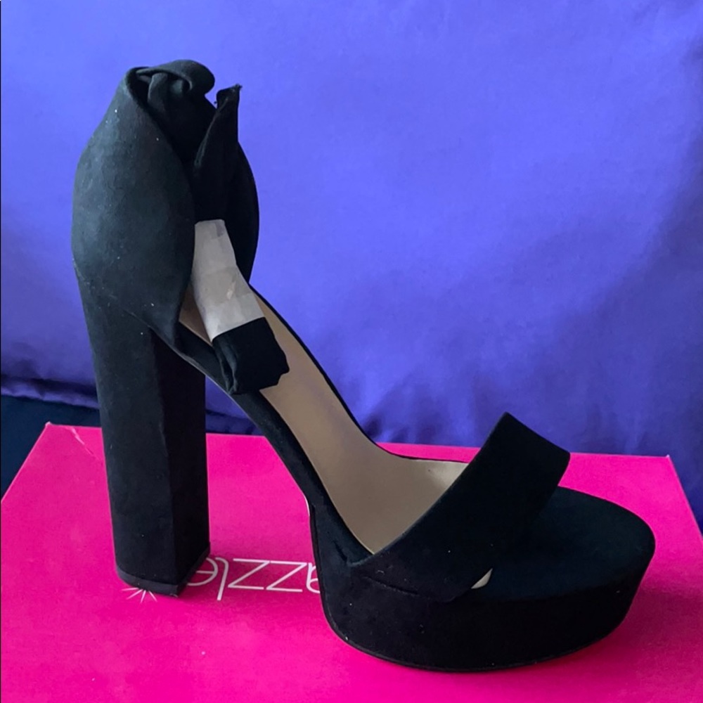 Black open toe heels. Brand new in box.